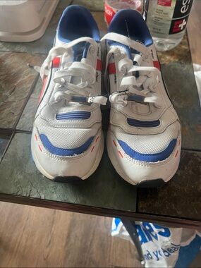 Puma Kids White Sneakers with Blue and Red Accents